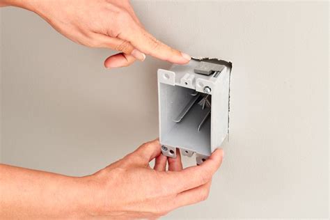 mount electrical box between studs|installing outlet box on stud.